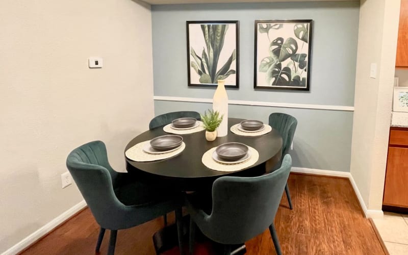 Dining area next to the kitchen at The Abbey at Energy Corridor in Houston, Texas