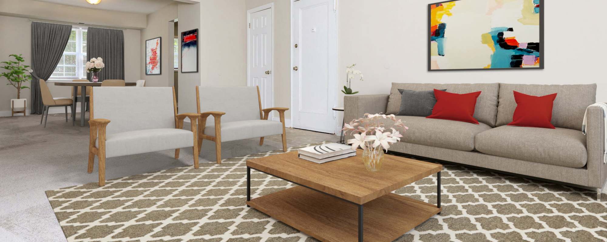 Furnished living room with cozy sofa and wooden center table at Parkland Village in District Heights, Maryland