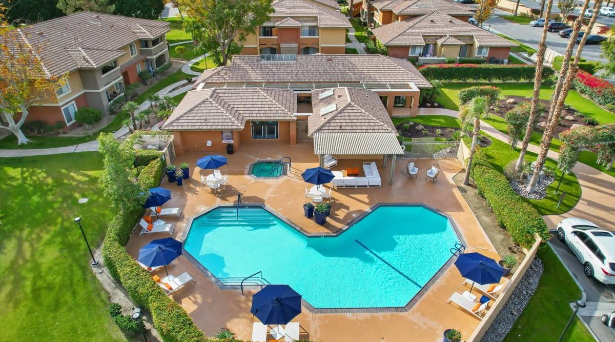 Aerial view of property and pool at  Mirabella Apartments in Bermuda Dunes, California