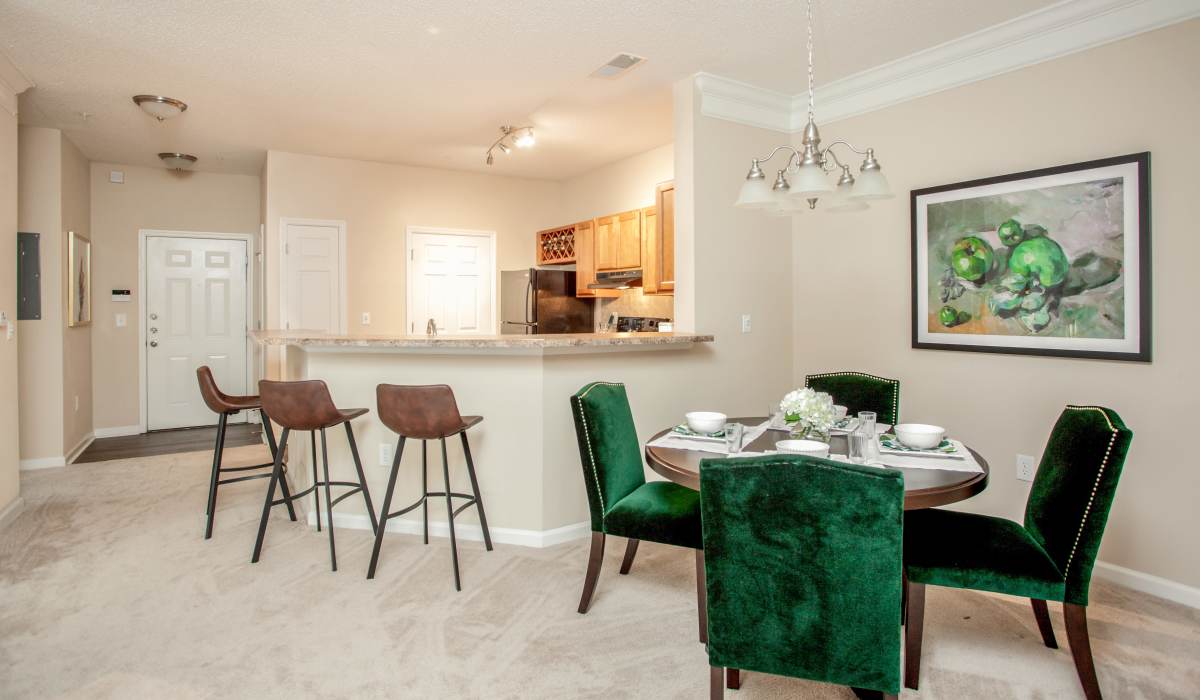 Luxury kitchen with island countertop and pendant lighting at Madison Park in Madison, Alabama