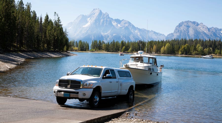 A truck putting a boat into the lake near KO Storage of Pierz in Pierz, Minnesota