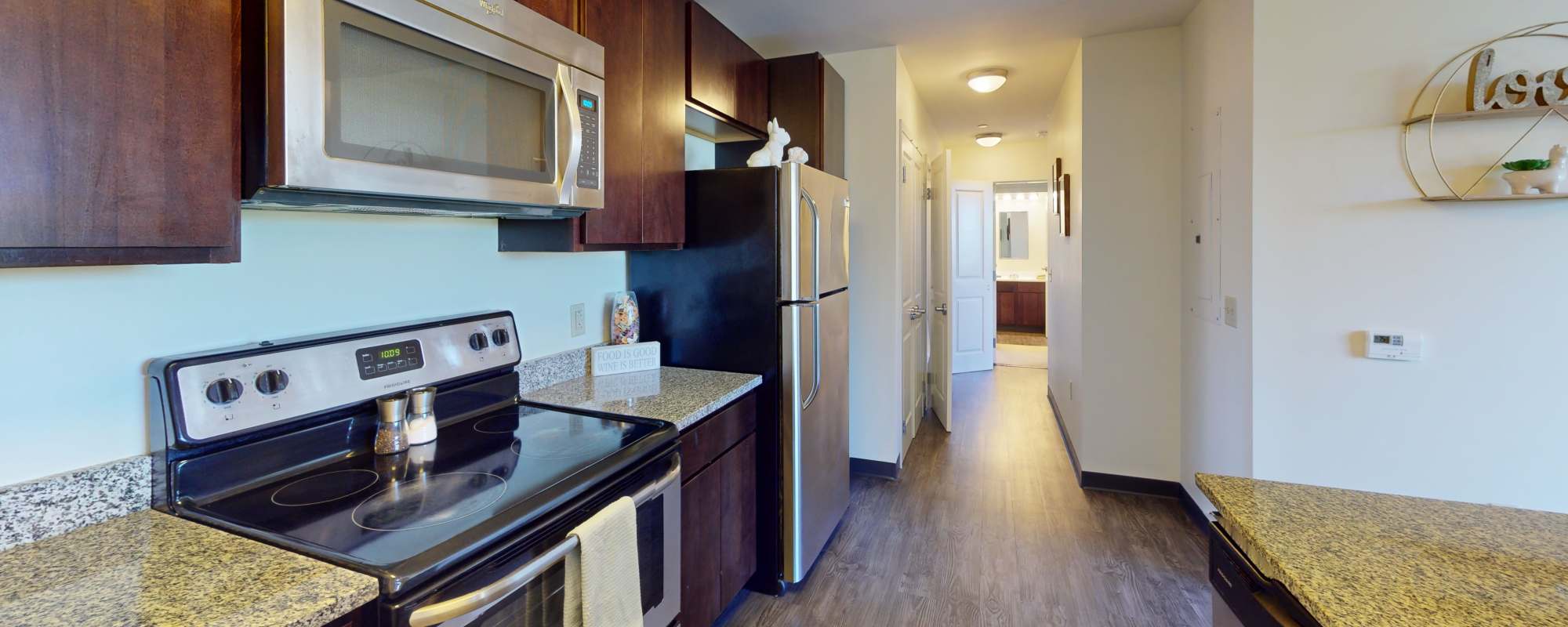 Kitchen with stainless-steel appliances at Hudson Lofts in Erie, Pennsylvania