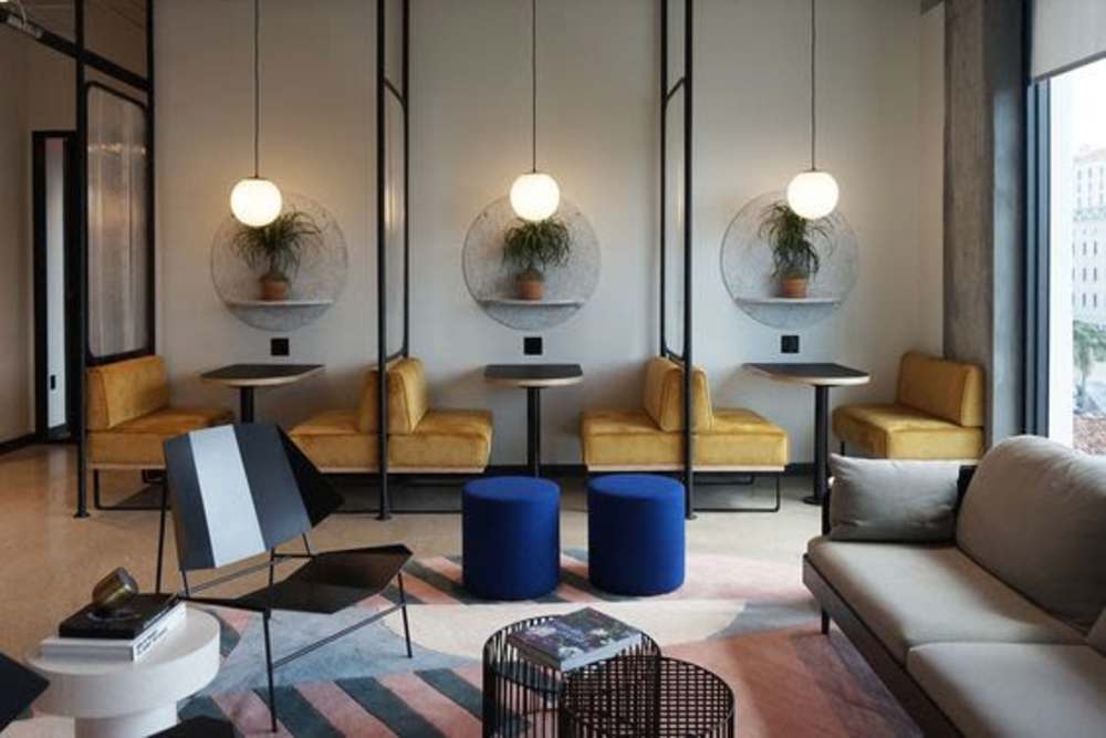 Cozy lounge with accent chairs at The Eleven Hundred in Sacramento, California