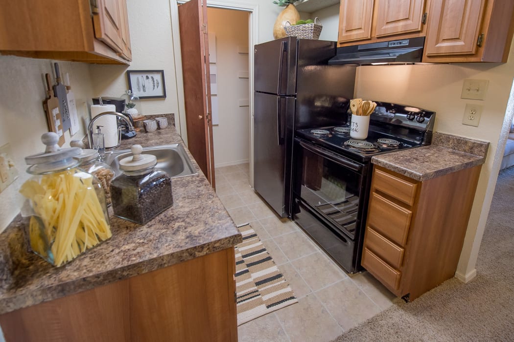Fully equipped kitchen at Sunchase Apartments in Tulsa, Oklahoma