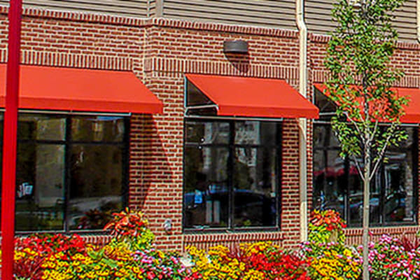 Front exterior view of apartments at Rochester Village Apartments at Park Place in Cranberry Township, Pennsylvania