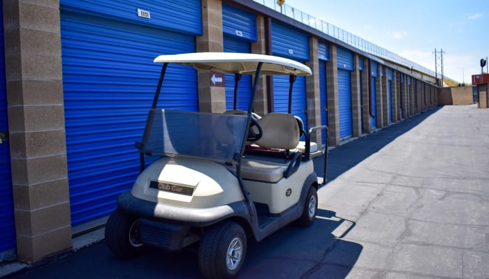 A golf cart in front of exterior storage units at STOR-N-LOCK Self Storage in Riverdale, Utah