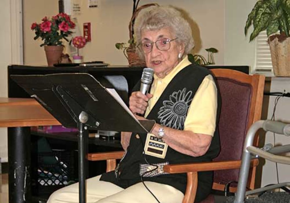 Resident having fun singing during a music class at Montello Care Center in Montello, Wisconsin