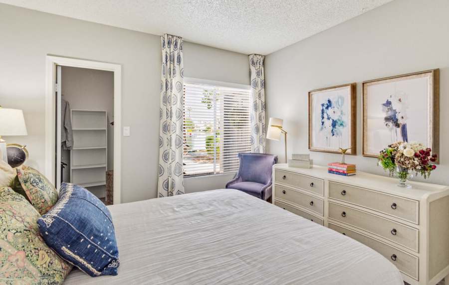 Modern bedroom with closets at Alcove at the Islands in Gilbert, Arizona