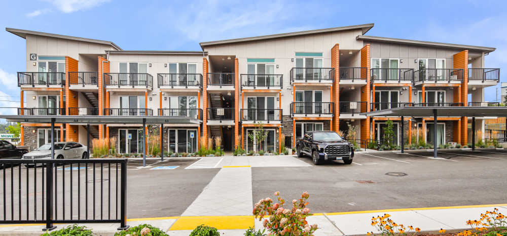 Exterior view of the apartment buildings showing the entrance at Allegro in Lynnwood, Washington 