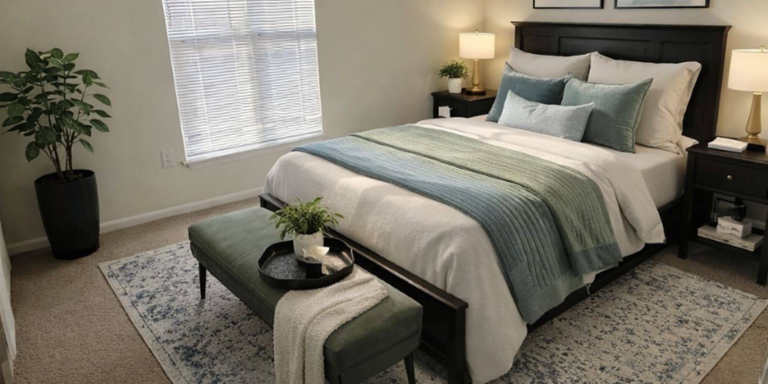 Bedroom with window at Lexington Place Apartments in West Columbia,South Carolina
