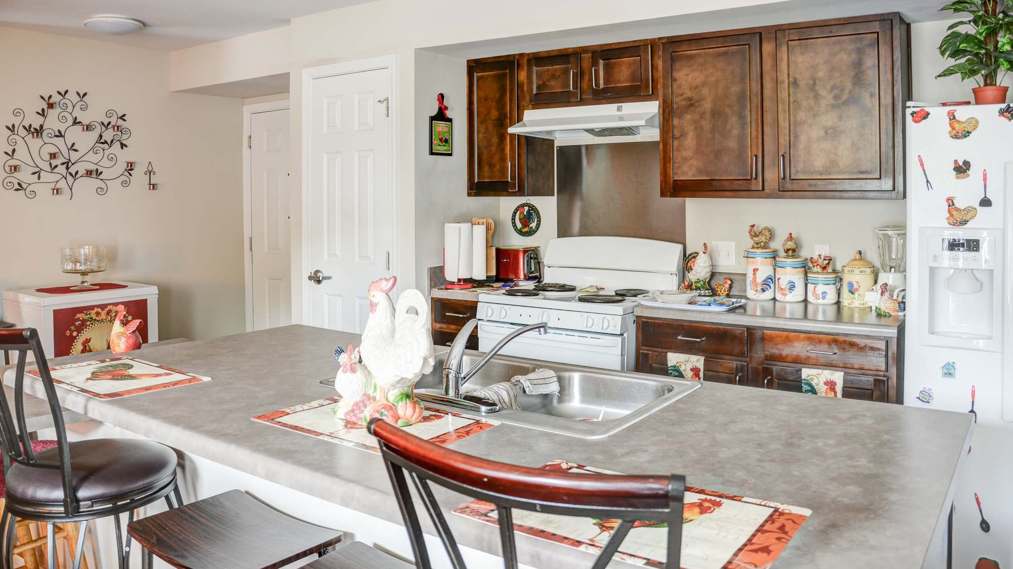 Kitchen with seating space and sink at Liberty Pointe in Petersburg, Virginia