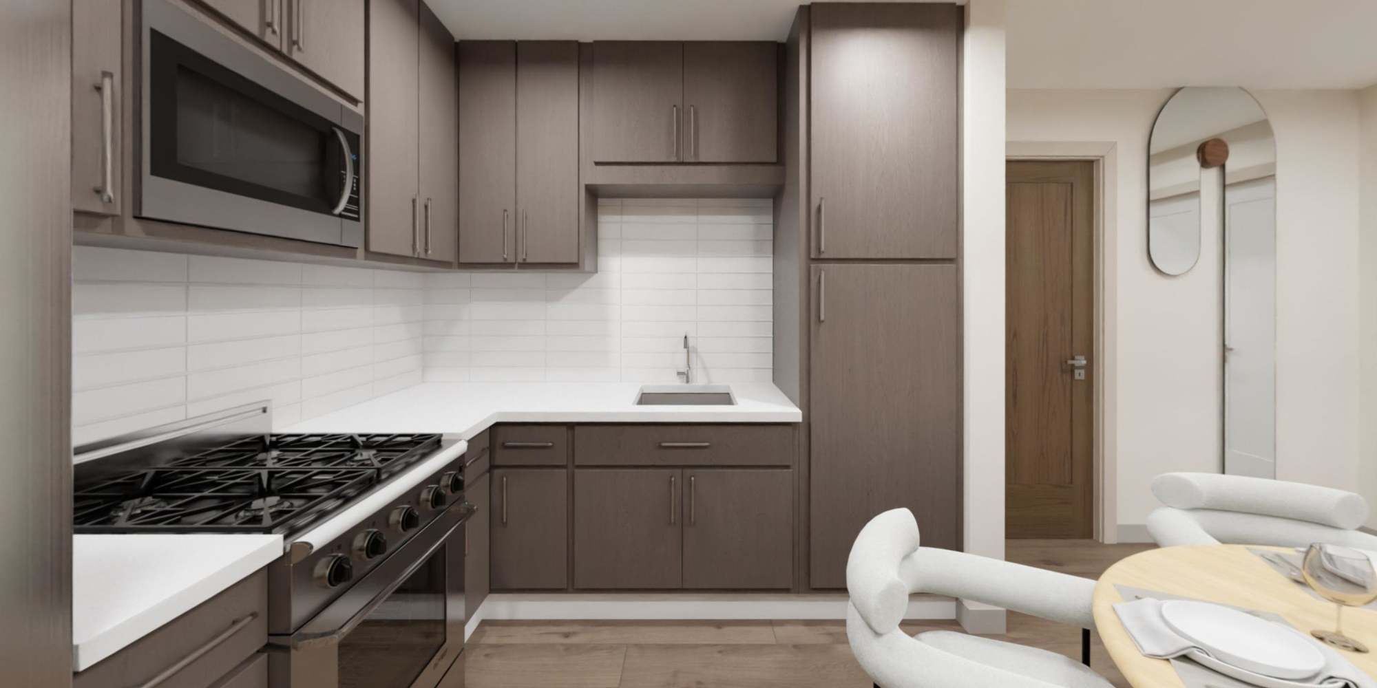 Kitchen with sleek appliances at The Julian in Pittsburgh, Pennsylvania