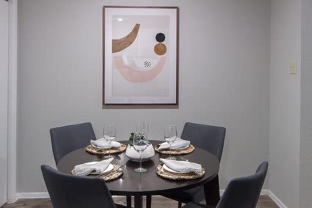 Modern dining room table in model home at Broadstone Briar Forest in Houston, Texas