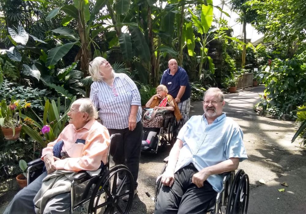 Residents on a stroll together outside at Geneva Lake Manor in Lake Geneva, Wisconsin