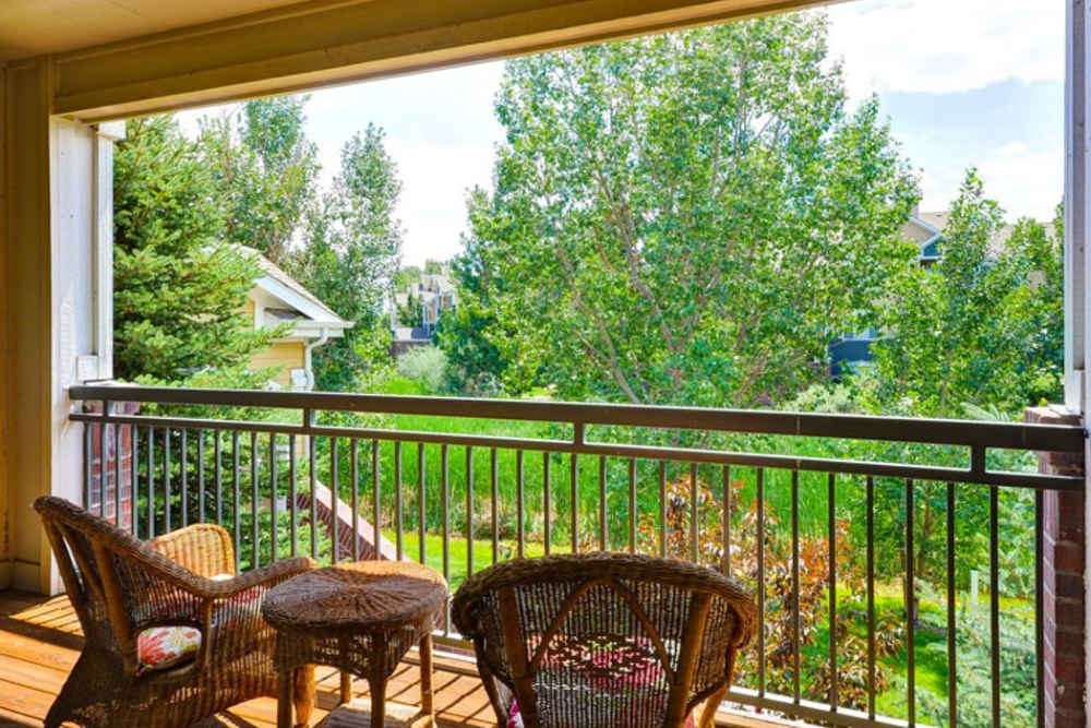 Private balcony at Legend Oaks Apartments in Aurora, Colorado