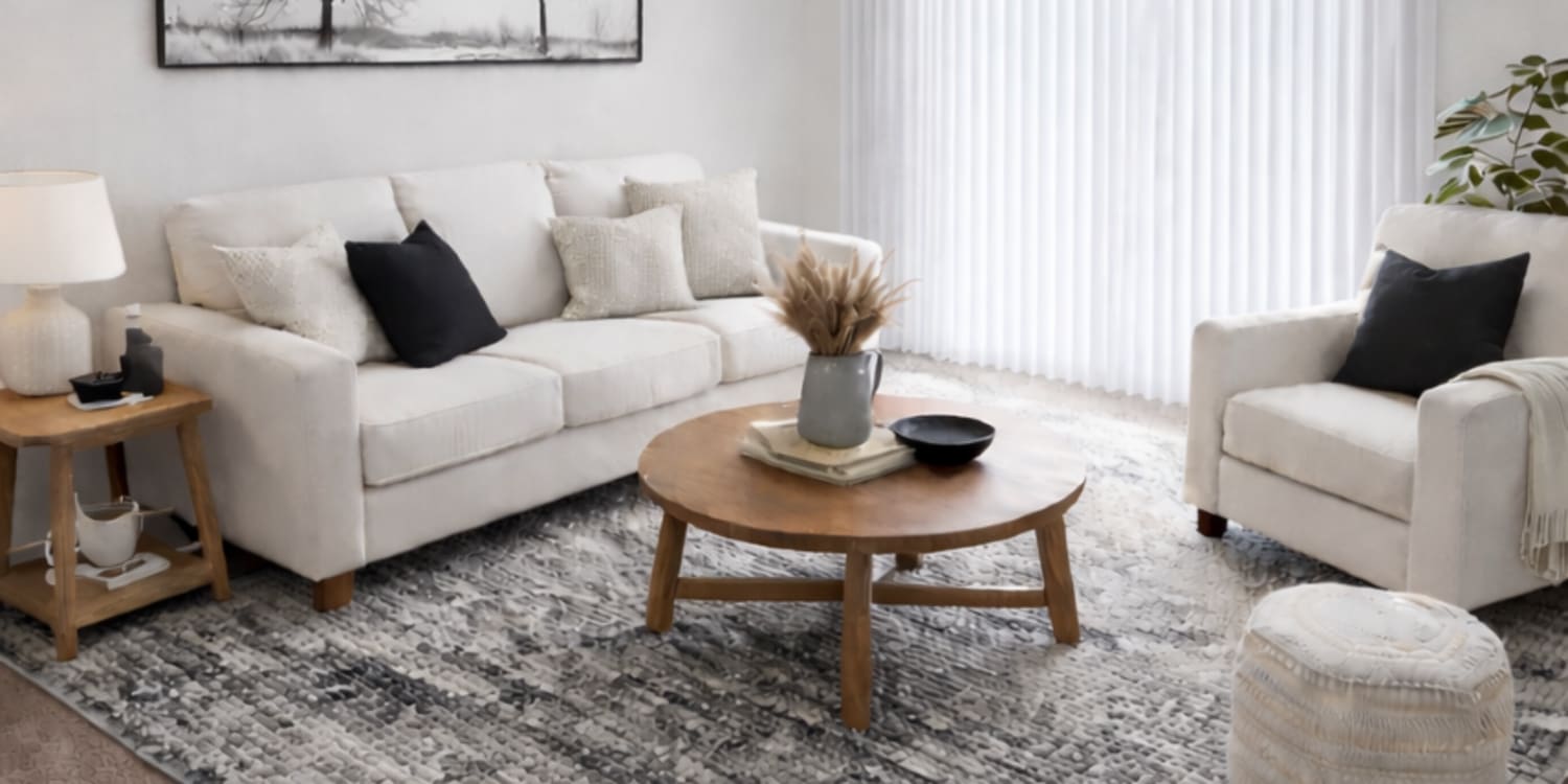 Living room with close access to patio at Lexington Place Apartments in West Columbia,South Carolina