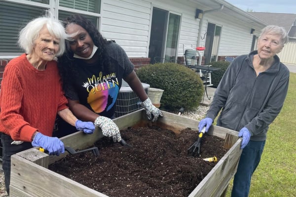 Residents gardening at Carolina Gardens at Conway in Conway, South Carolina