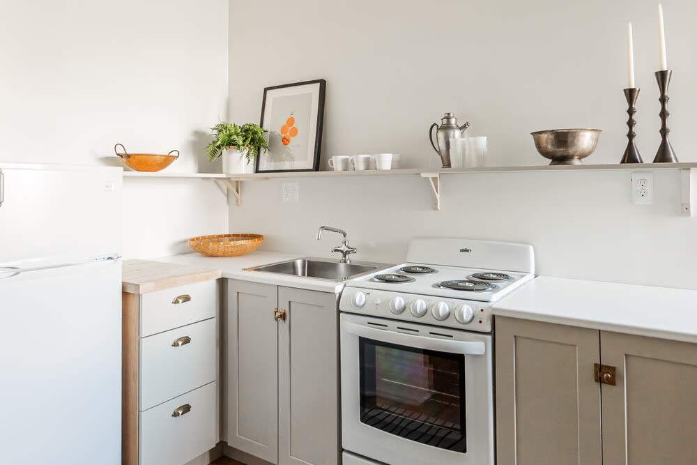 Kitchen with oven at Detroit Living in Detroit, Michigan