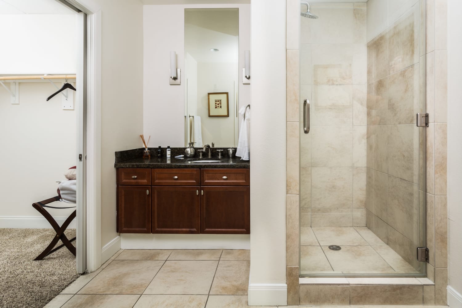 Modern bathroom with granite at The Heights at Park Lane in Dallas, Texas