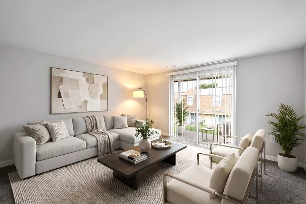 Living room with natural light at Pleasant View Townhomes in Baltimore, Maryland