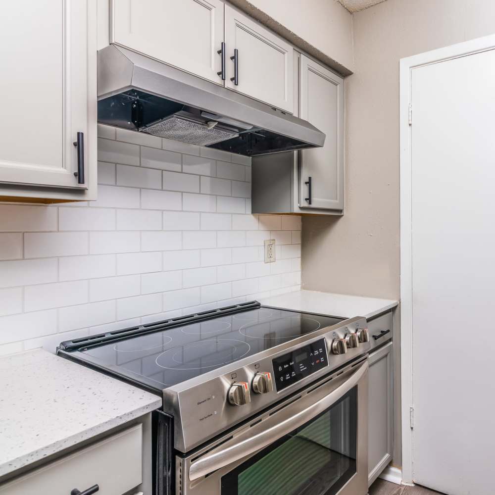 Renovated kitchen at Athena Apartments in Benbrook, Texas