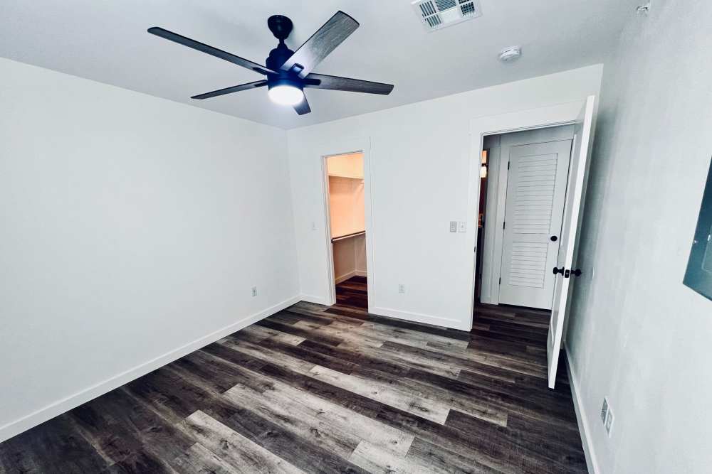 Bedroom with ceiling fan at Quail Run in Oklahoma City, Oklahoma 