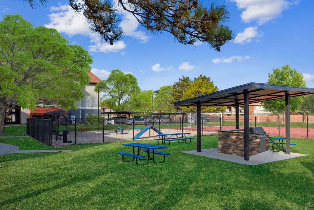 Covered BBQ and picnic area and Dog Park at Shadowbrook Apartments in West Valley City, Utah