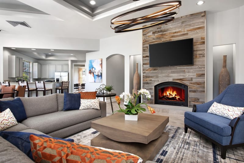 Modern decor and fireplace in lobby at The Aspect in Kissimmee, Florida