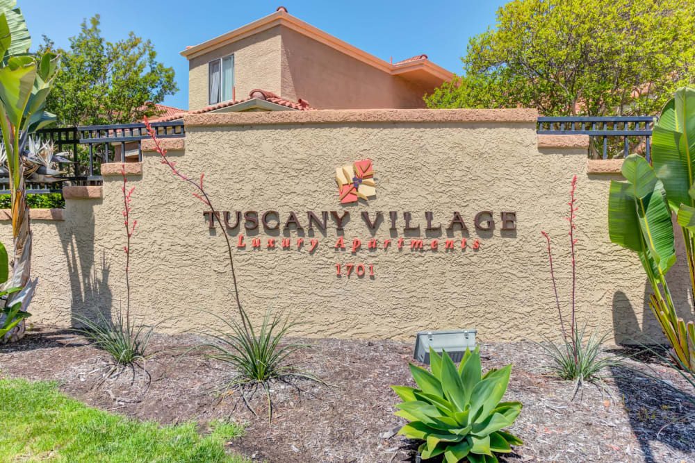 The front sign at Tuscany Village Apartments in Ontario, California