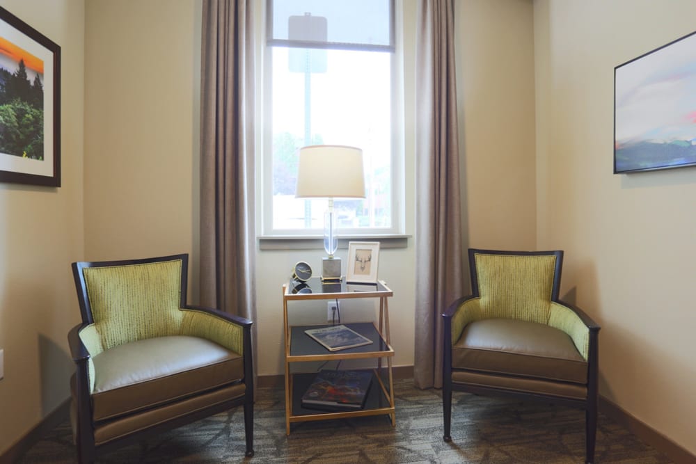 Resident reading nook in senior apartment at The Lofts at Glenwood Place in Vancouver, Washington