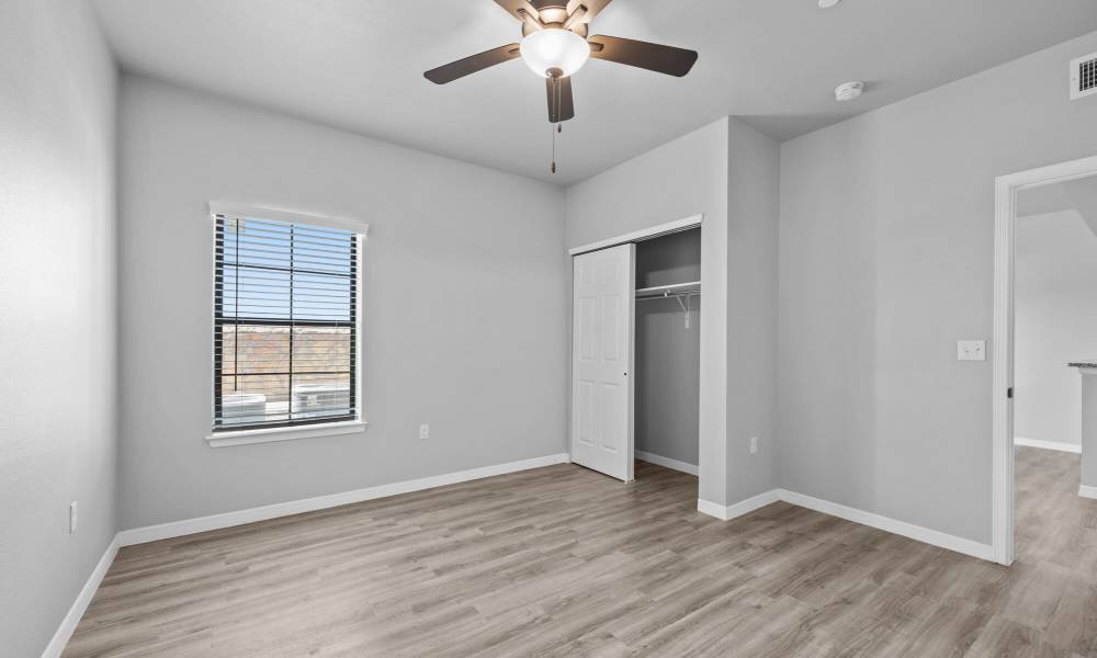 Bedroom with ceiling fan at District At Pellicano in El Paso, Texas