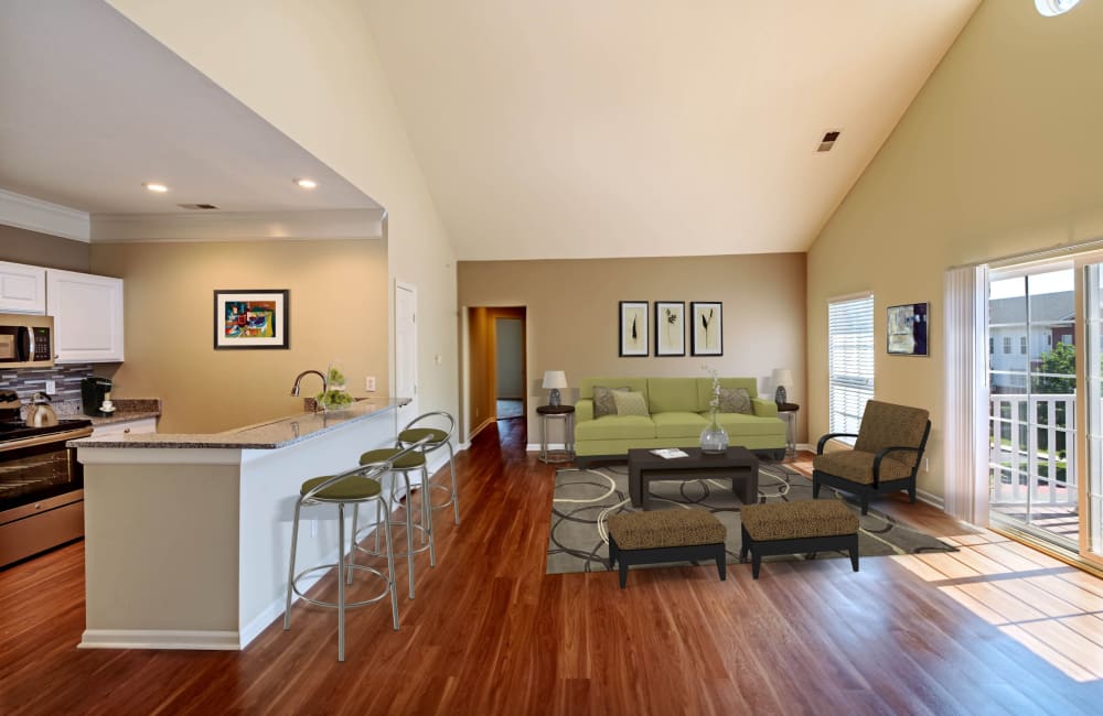 Kitchen and living room in a home at Christopher Wren Apartments & Townhomes in Wexford, Pennsylvania