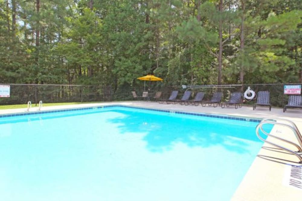 Lounge chairs by the pool at Amber Oaks in Durham, North Carolina