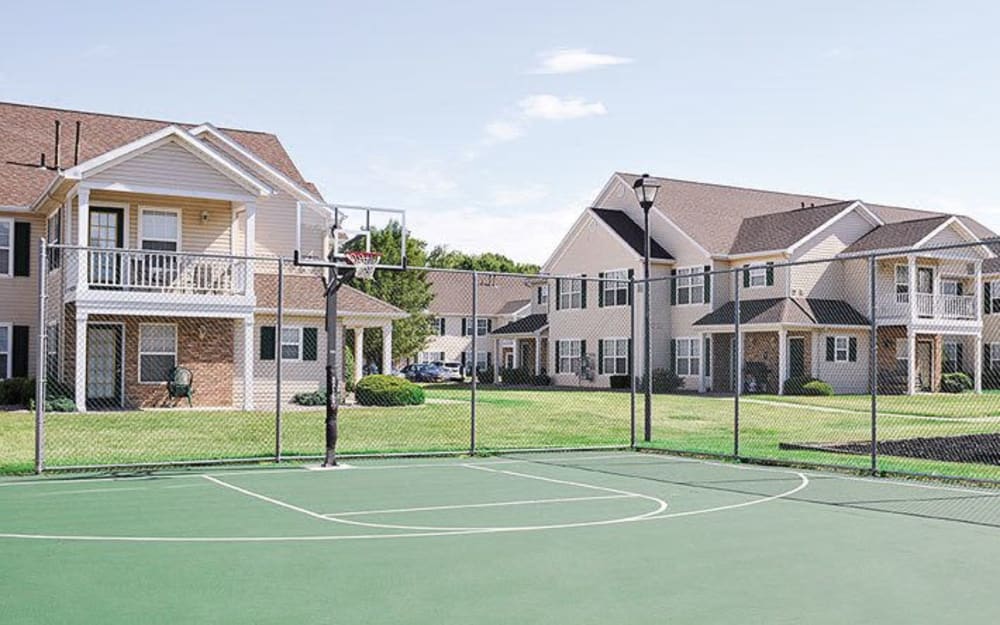 Sports court and playground at Westview Commons Apartments in Rochester, New York
