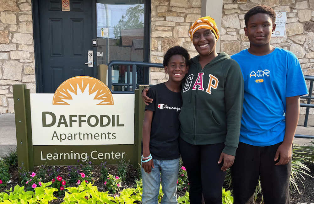 Family at Learning Center entrance at Daffodil in Austin, Texas
