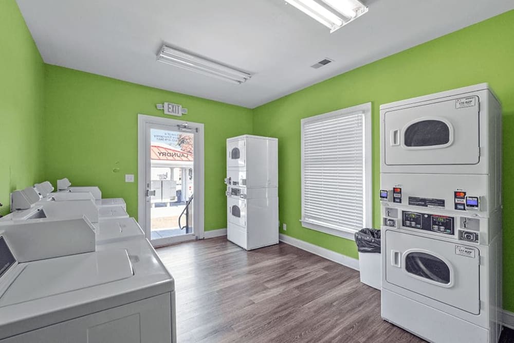 Laundry facility with bright green paint at Addison Park Apartments, Louisville, Kentucky