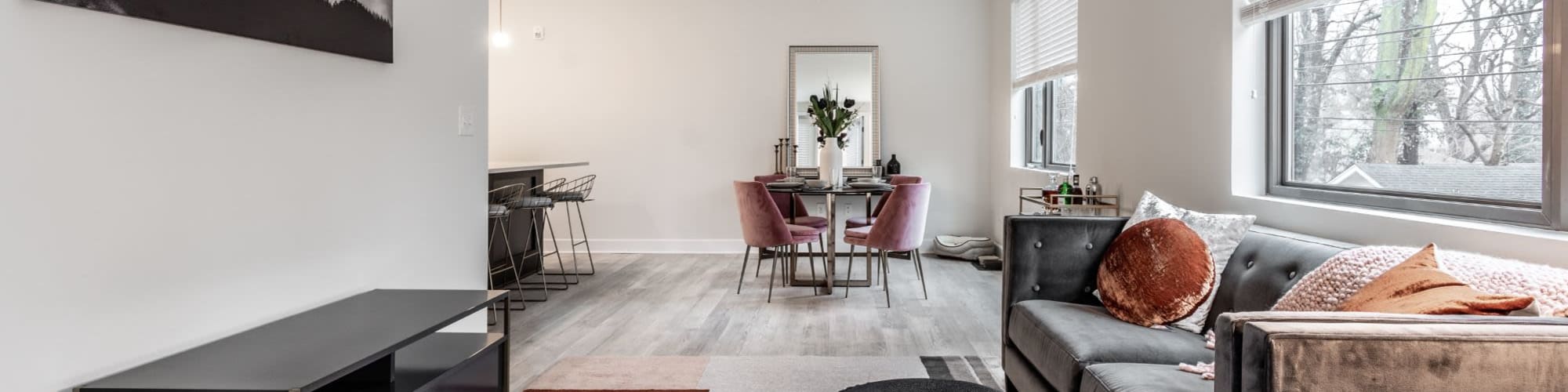 Photo of a large living room staged with stylish furniture