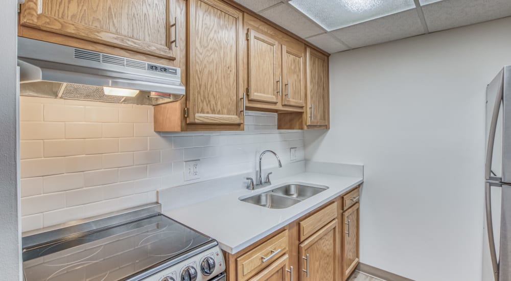 Renovated model kitchen with stainless appliances Lakeland Place in Waterford, Michigan