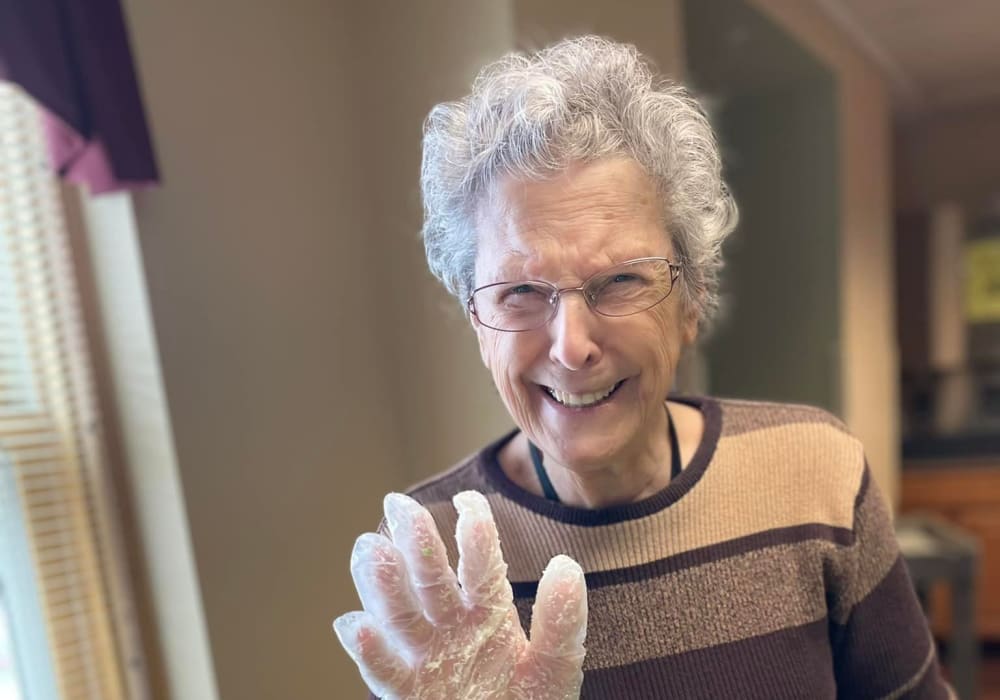 Resident with baked goods at Bell Tower Residence Assisted Living in Merrill, Wisconsin