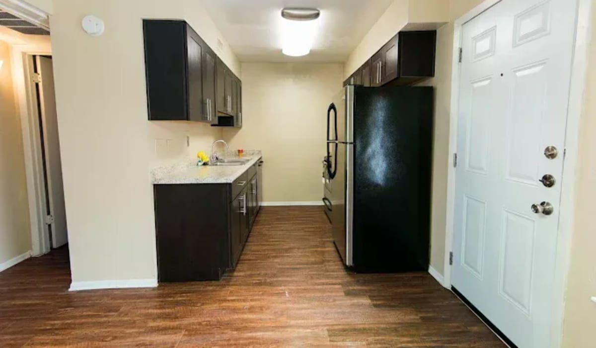 Apartment kitchen at Tradewind Apartments in Mesquite,Texas