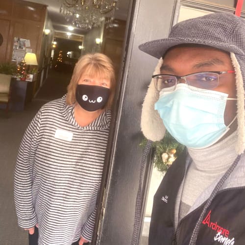 2 Masked caretakers at Canoe Brook Assisted Living in Ardmore, Oklahoma