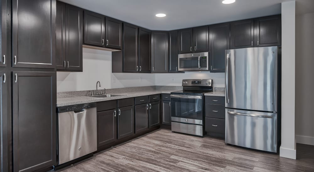 Gourmet kitchen with stainless-steel applinces at 60 Mansfield Road in New London, Connecticut