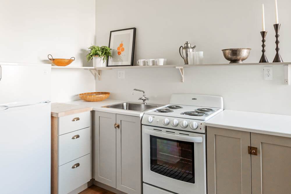 Kitchen with oven at Detroit Living in Detroit, Michigan