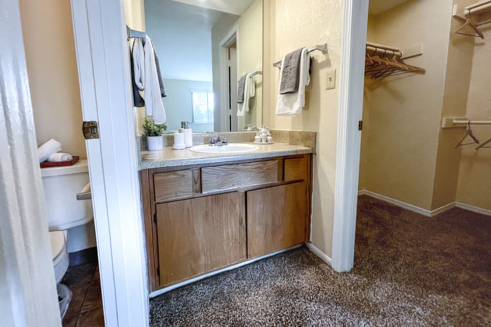 Bathroom with vanity unit at Stonehaven Apartments in Hazelwood,Missouri