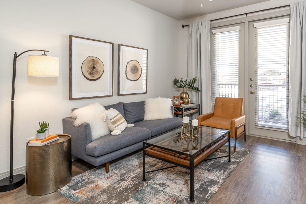 Bright and modern living room at Olympus Hudson Oaks in Hudson Oaks, Texas