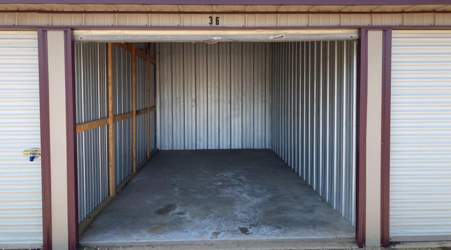 Storage units with white doors and locks at KO Storage in Pillager, Minnesota