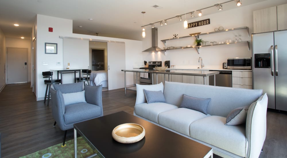 Model home's living space with wood flooring at 747 in Indianapolis, Indiana