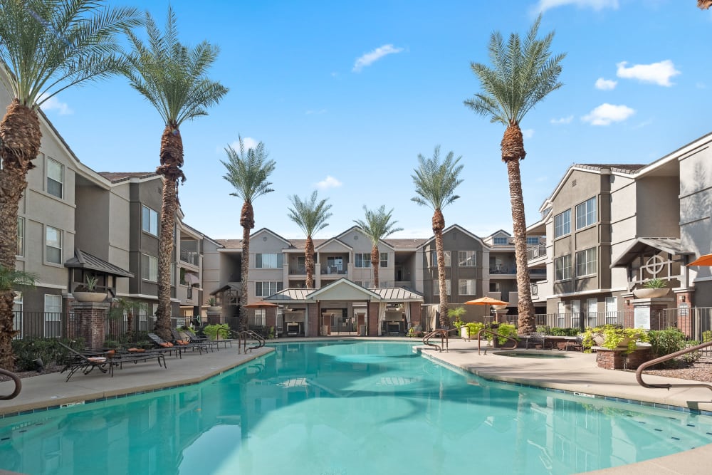 Luxury pool with lounge seating at Citi on Camelback in Phoenix, Arizona