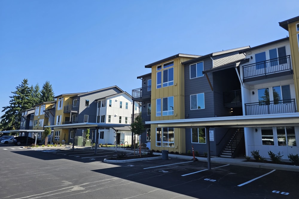 Exterior view with carports at Alta Crossing in Marysville, Washington