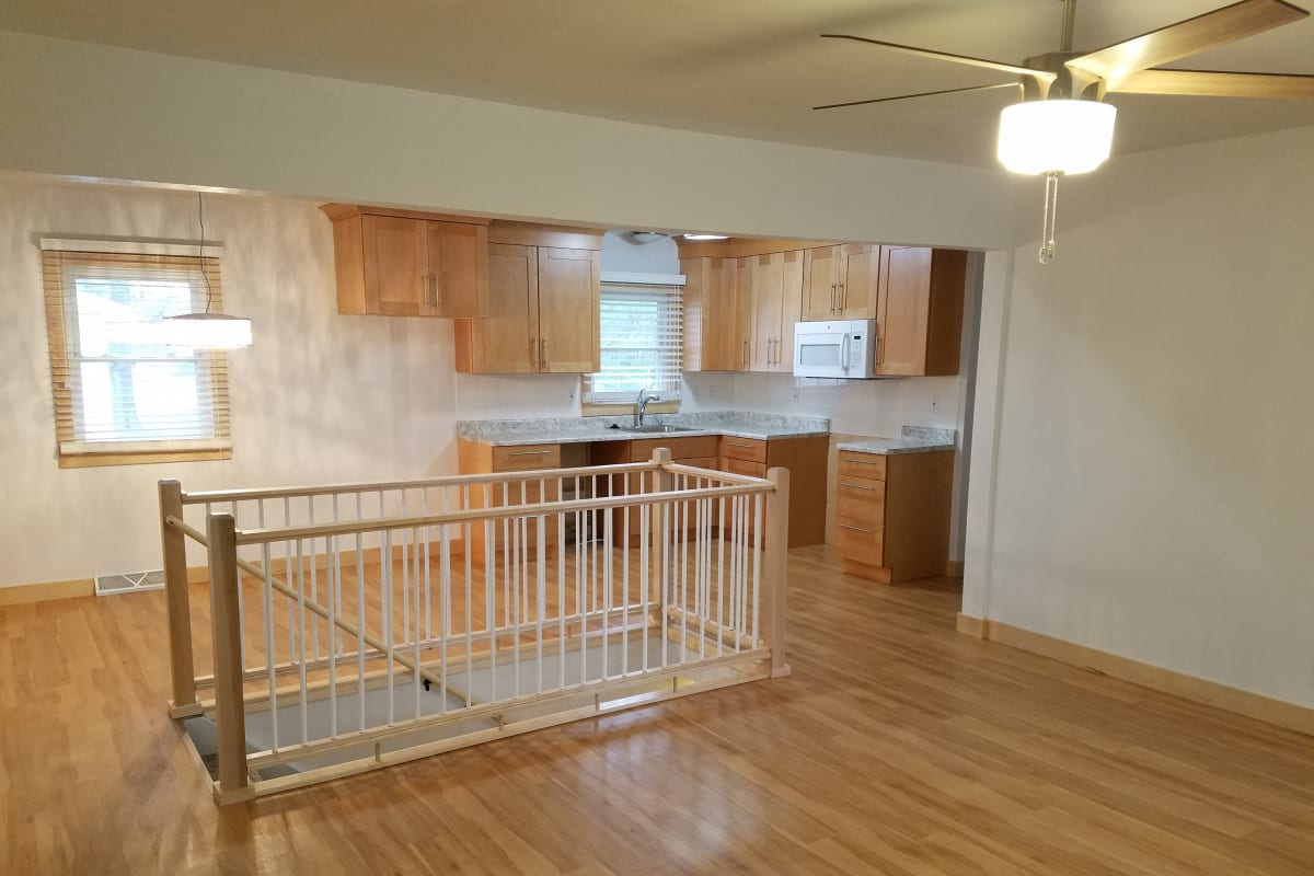 Wood-style flooring in a home at Traditional Housing in Cedar Falls, Iowa